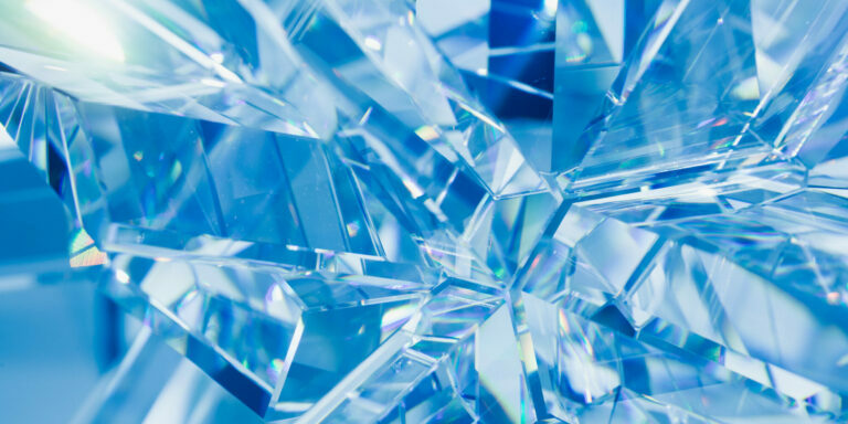 abstract blue background of crystal refractions